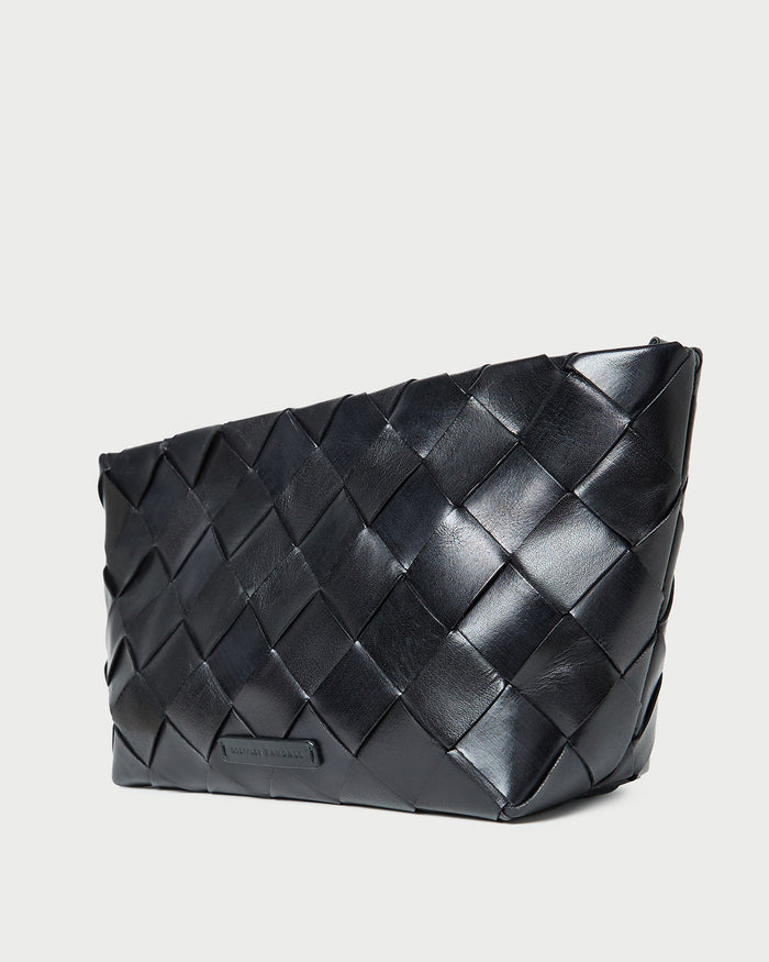 Melina Black Woven Leather Clutch in black woven leather.