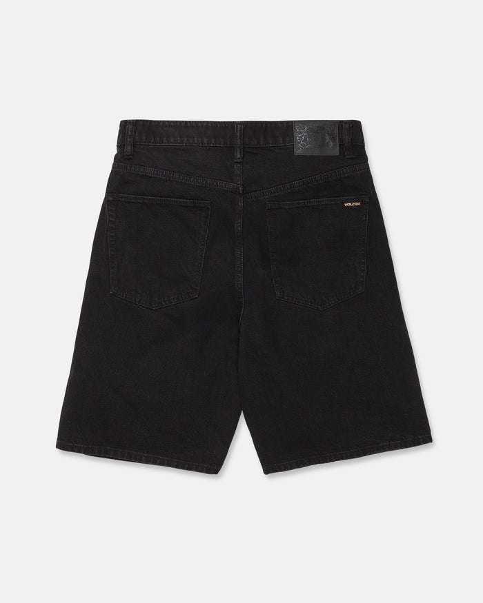 The Men's Billow Denim Shorts by Volcom are displayed from the back, highlighting two large back pockets and a black patch on the waistband. Featuring a relaxed silhouette inspired by baggy denim shorts, they also showcase a small gold SOLLACK label above the right pocket.