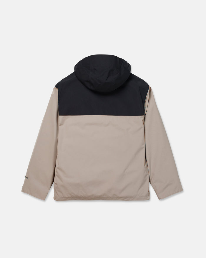 Men’s Buckthreeeighty Jacket by Volcom in beige, featuring long sleeves and a black hood with a contrasting upper back panel, crafted from V-Science 2-Layer fabric with PFAS-free DWR for enhanced protection, shown laid flat in a back view against a white background.