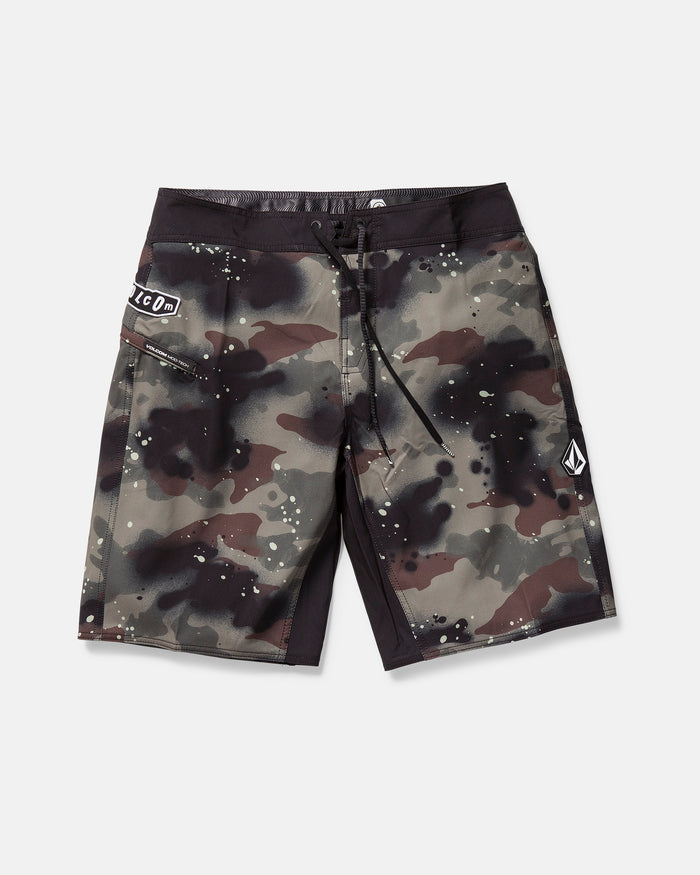 The Volcom Men's Fomenter Mod boardshorts in camouflage print feature 4-way stretch Stone Shield fabric, a black waistband and side panels, front drawstring, and two logo patches on the left leg and near the waist pocket.