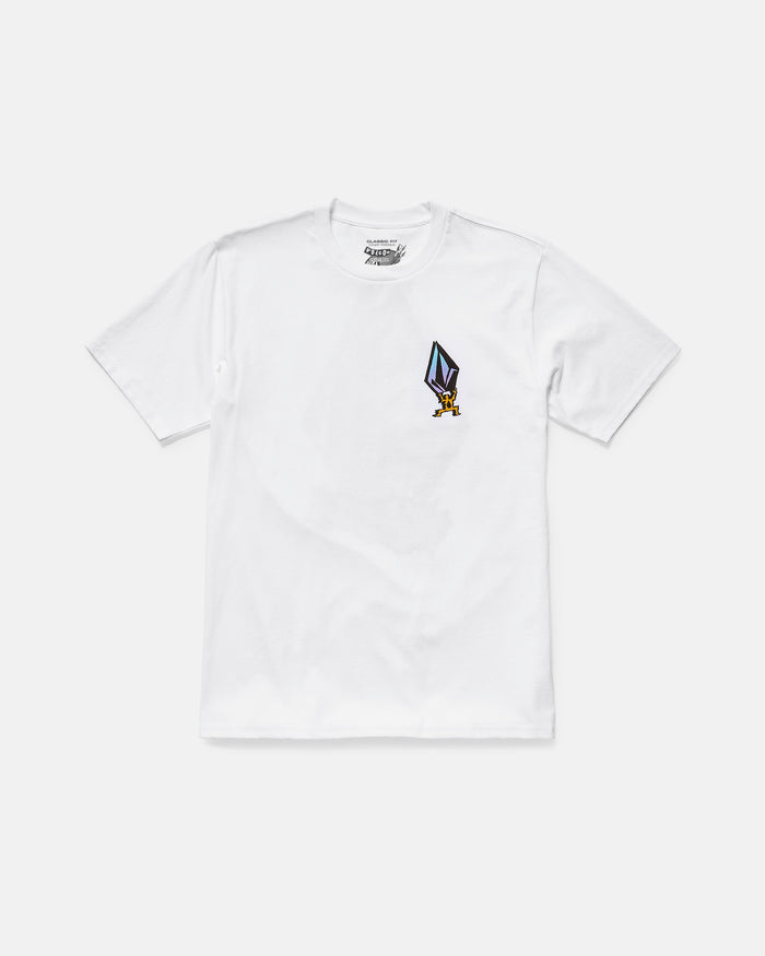 The Volcom Men's Star Shields Featured Artist Exp Short Sleeve Tee is a 100% cotton white t-shirt with a small, colorful cartoon character holding a pencil graphic from the Star Shields collection on the left chest.