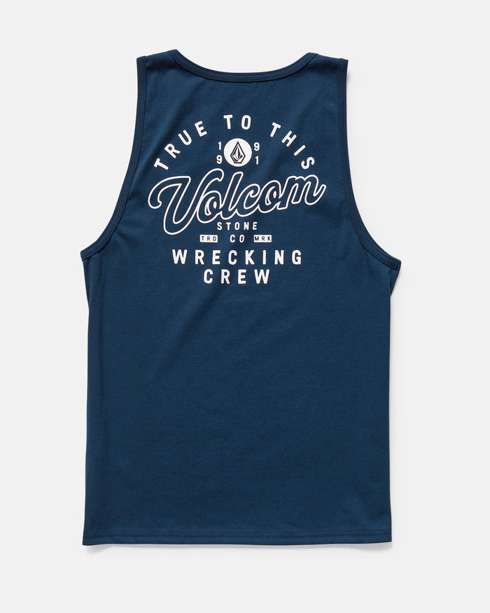 The Men's Wrecking Tank by Volcom is navy blue, made from 100% cotton in a classic fit. It features white "True To This, Volcom Stone Co. Wrecking Crew" text on the back and a small geometric logo above "Volcom.