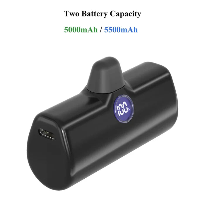 Black battery pack with digital display on a white background