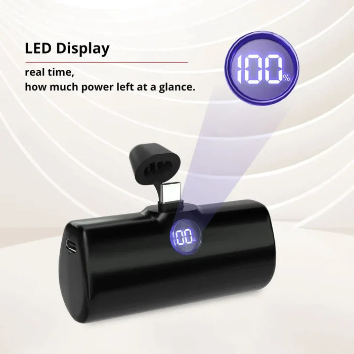 Black power bank with LED display showing battery percentage on a white background
