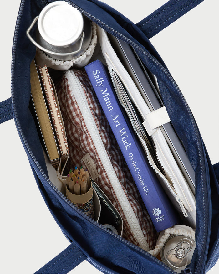 Mira Navy Everyday Tote Bag in navy water-resistant nylon.
