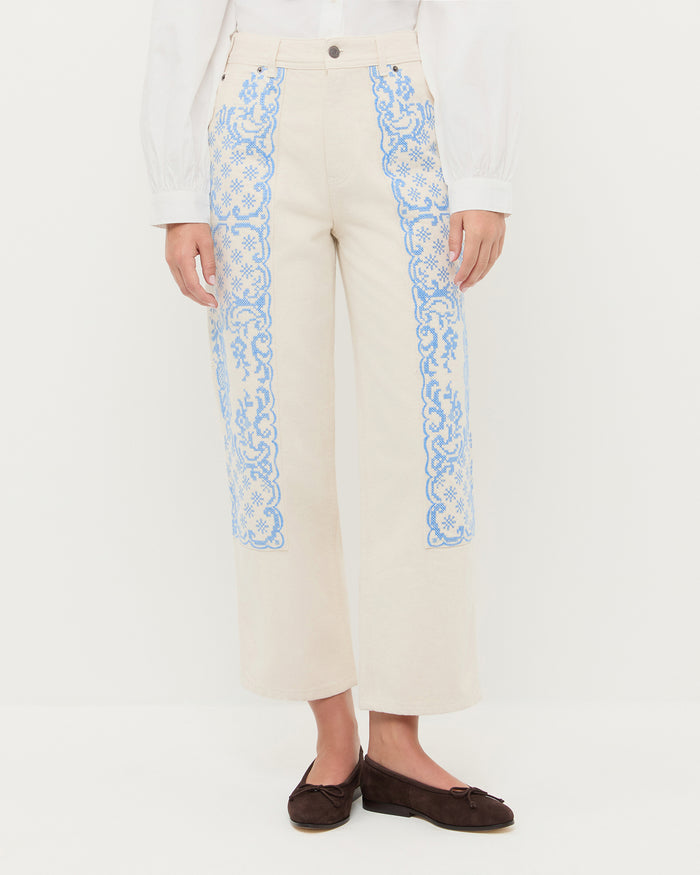Molly Workwear Jean in natural denim with blue embroidery, Gail Blouse in white cotton, and Noelle Brown Suede Ballet Flat.