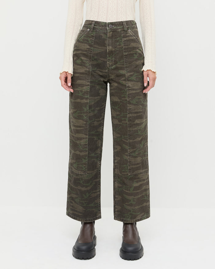 Molly Workwear Jean in dark camo denim, Lolo Pointelle Long-Sleeve Top in cream pointelle, and Suri Brown Leather Lug Boot.
