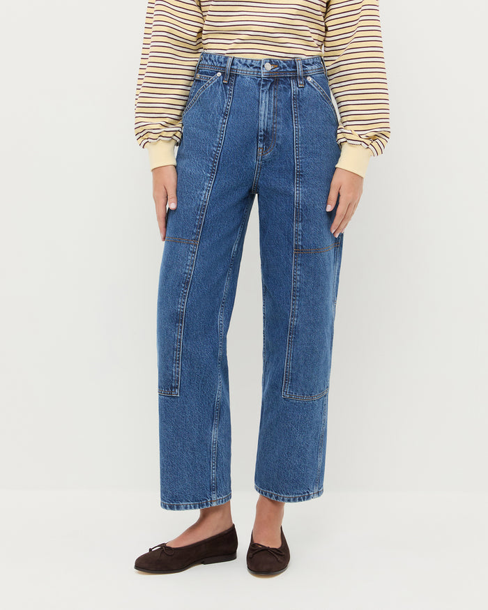 Molly Workwear Jean in medium wash blue denim, Scout Long-Sleeve Top in butter yellow, and Noelle Brown Suede Ballet Flat.