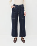 Molly Workwear Jean in dark blue denim, Lolo Pointelle Long-Sleeve Tee in cream cotton, and Cooper Dark Brown Mary Jane Sneaker.