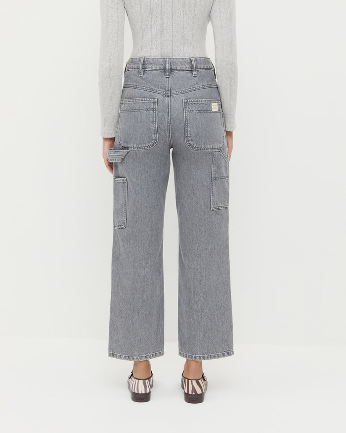 Molly Workwear Jean in grey denim, Ash Pointelle Cardigan in grey cotton, and Cooper Zebra Mary Jane Sneaker.