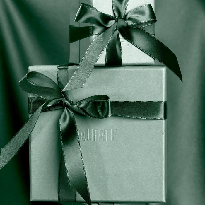 Two gift boxes with black ribbons on a dark background Model