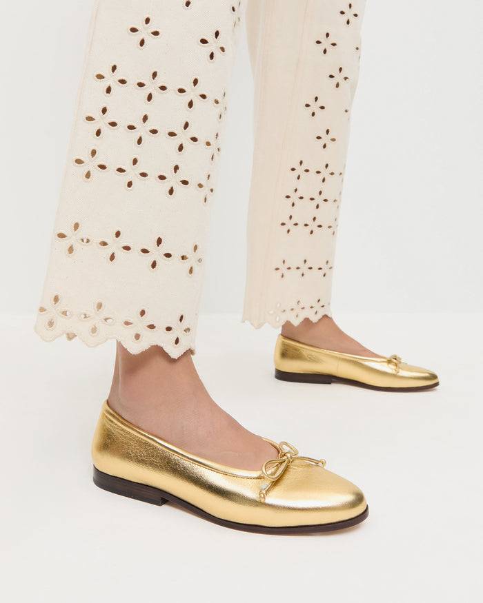 Noelle Champagne Ballet Flat in champagne leather and Demi Embroidered Pant in natural denim.