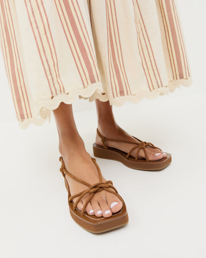 Nomi Platform Sandal in cacao suede and Alison Camisole Dress in yellow and brown striped cotton.