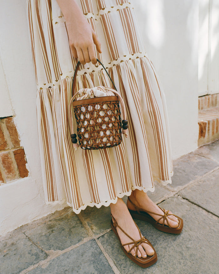Nomi Platform Sandal in cacao suede and Alison Camisole Dress in yellow and brown striped cotton.