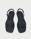 Noor Black Leather Flat Sandal in black leather.