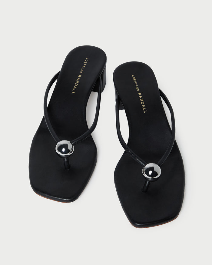 Odessa Black Leather Heeled Sandal in black leather with a silver ball accent.