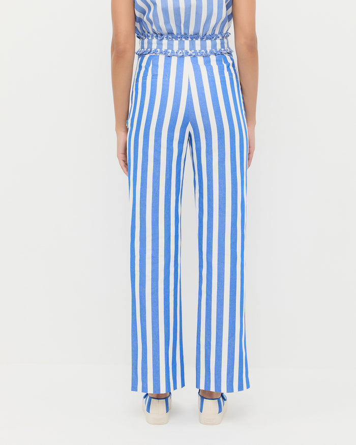 Pasha Trouser in blue and cream stripped cotton-linen, Veda Top in blue and cream stripped cotton, and Cooper Blue Striped Mary Jane Sneaker.