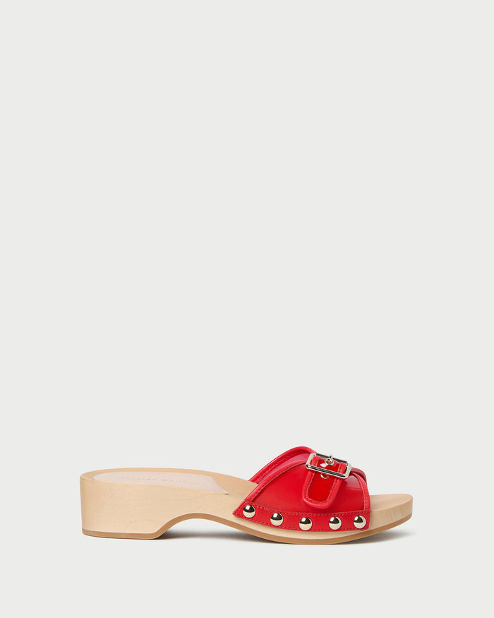 Paulie Red Studded Sandal in red pvc with champagne stud accents.