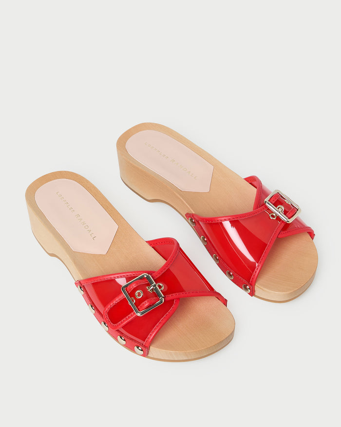 Paulie Red Studded Sandal in red pvc with champagne stud accents.