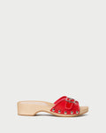 Paulie Red Studded Sandal in red pvc with champagne stud accents.