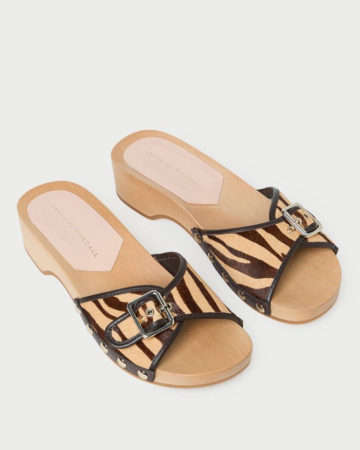 Paulie Zebra Studded Sandal in zebra hair calf leather with champagne accent studs.