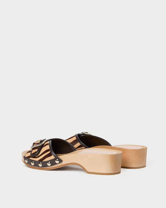 Paulie Zebra Studded Sandal in zebra hair calf leather with champagne accent studs.