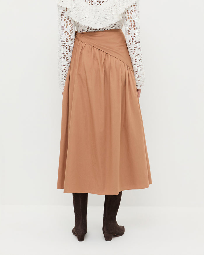 Peyton Skirt in light brown cotton, Abigail Top in cream cotton, and Cleo Brown Suede Boot.