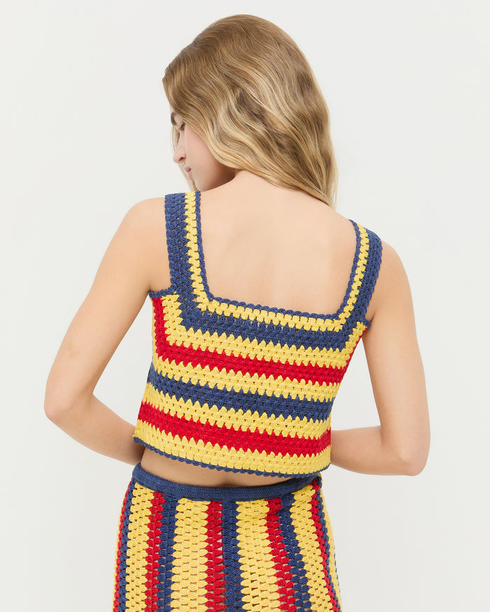 Prescott Crochet Top in yellow, red, and navy striped hand-crocheted cotton and Lela Crochet Skirt in yellow, red, and navy striped hand-crocheted cotton.