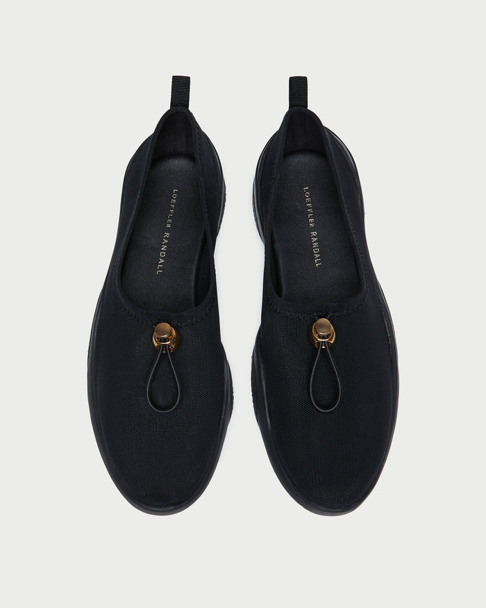 Raina Black Mesh Flat in black mesh.