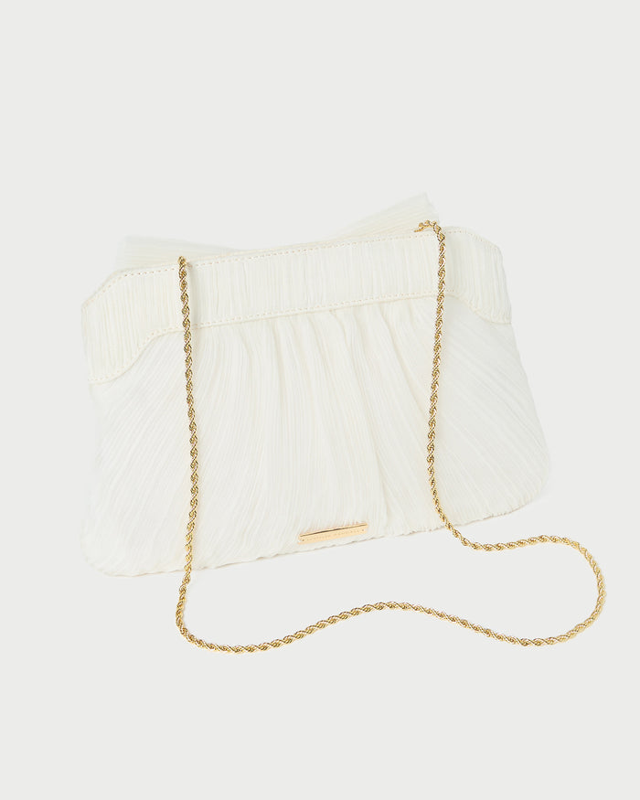 Rayne Pearl Bow Clutch in pearl fabric