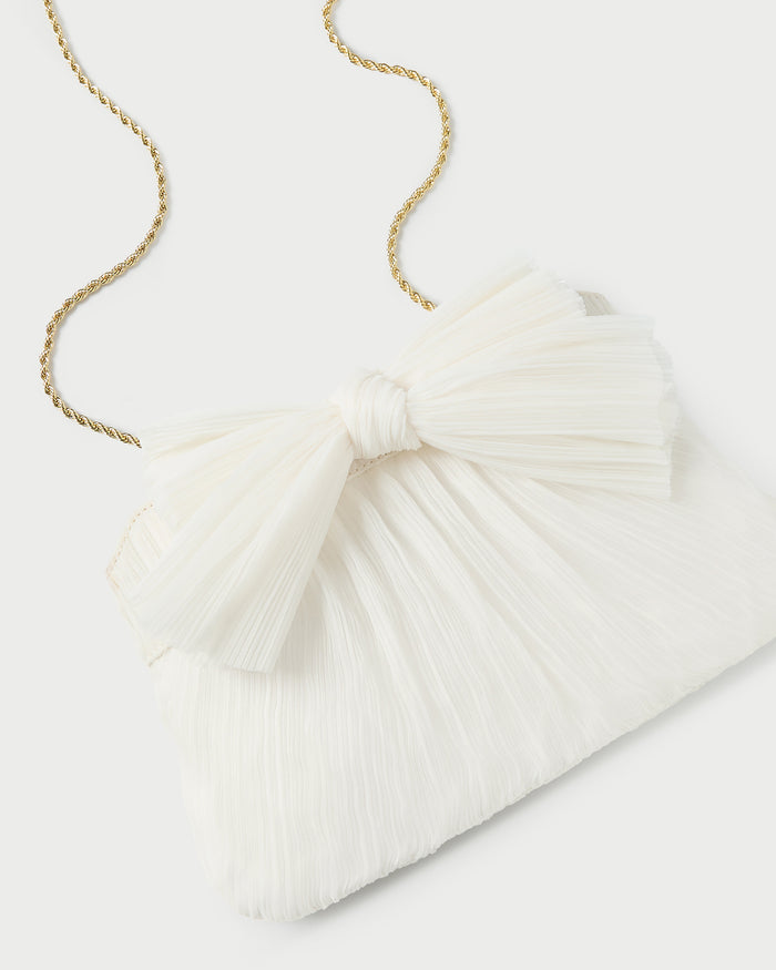 Rayne Pearl Bow Clutch in pearl fabric