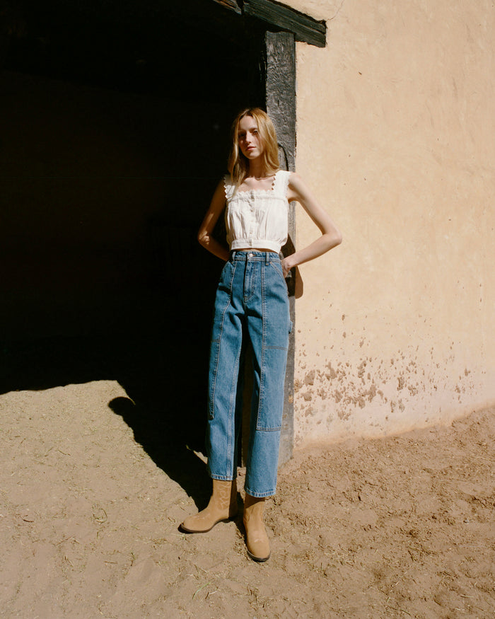 Runa Top in cream cotton, Molly Workwear Jean in medium washed denim, and Jett Sand Suede Calf Boot.