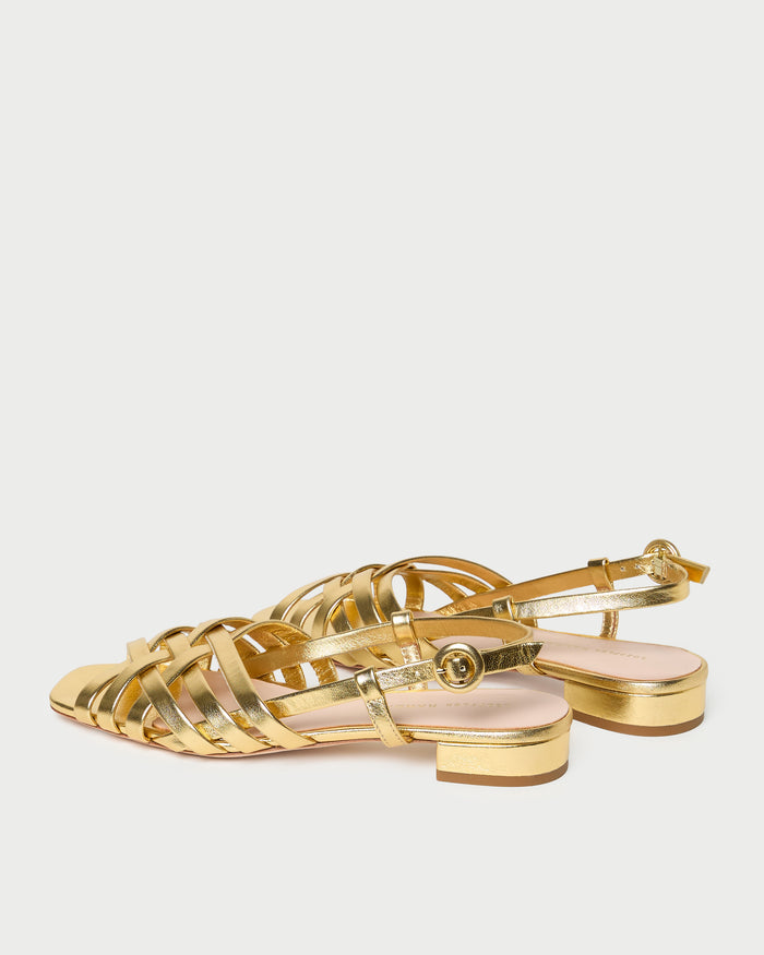 Shelly Gold Leather Flat Sandal in gold metallic leather.