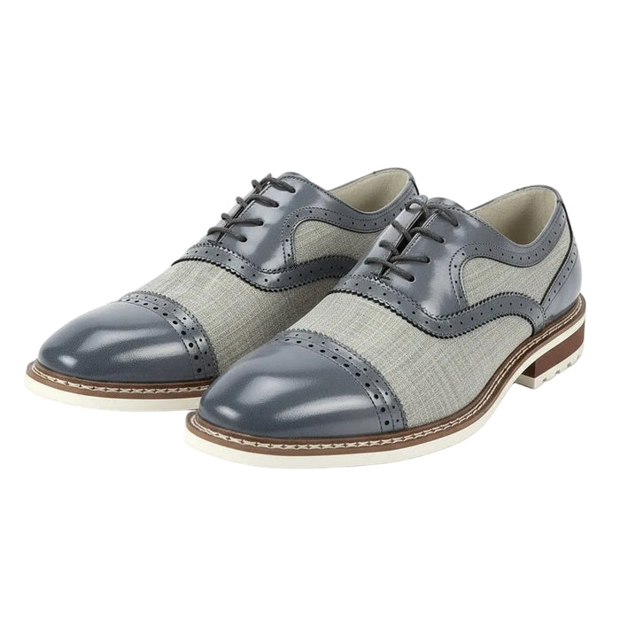 Pair of gray and white dress shoes on a white background