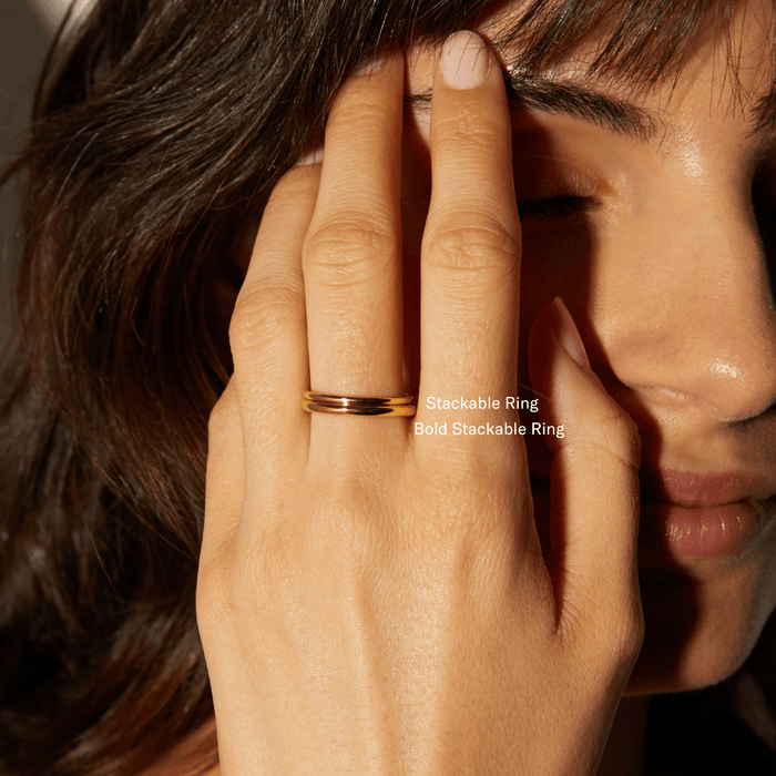 Lifestyle Model close up of woman wearing gold stackable ring