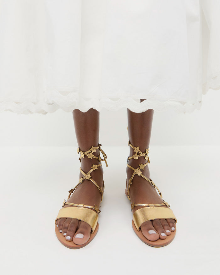 Starla Gold Wrap Sandal in gold metallic leather and Alison Camisole Dress in white cotton.