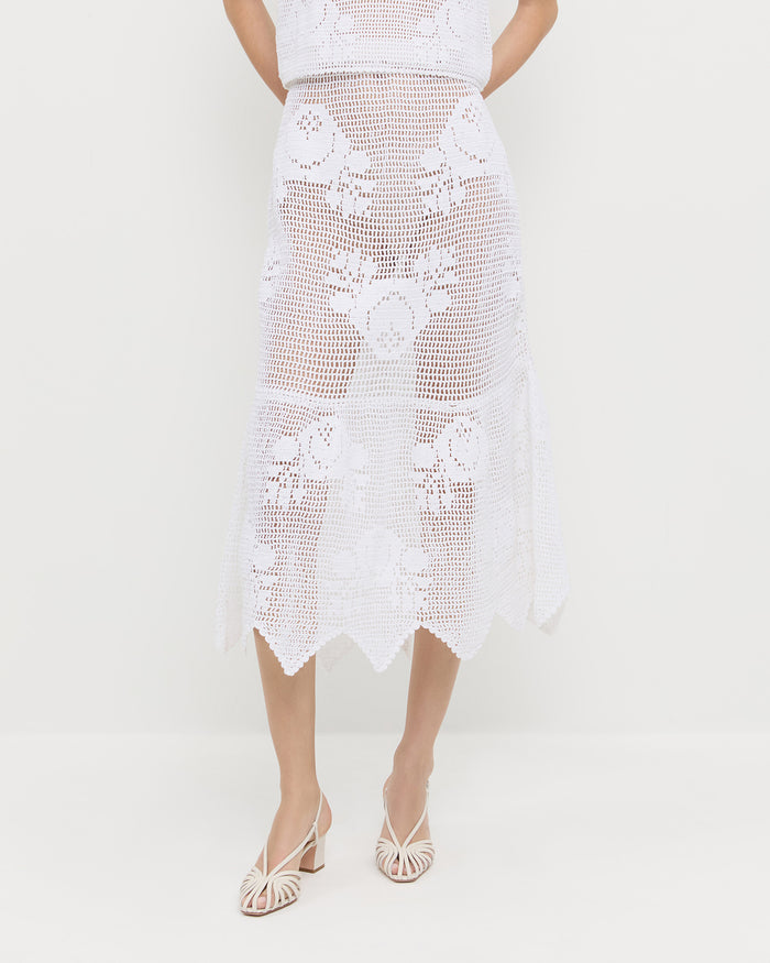 Sullivan Crochet Skirt in cream crocheted cotton, Aurelie Crochet Top in cream crocheted cotton, and Priscilla Cream Heeled Sandal.