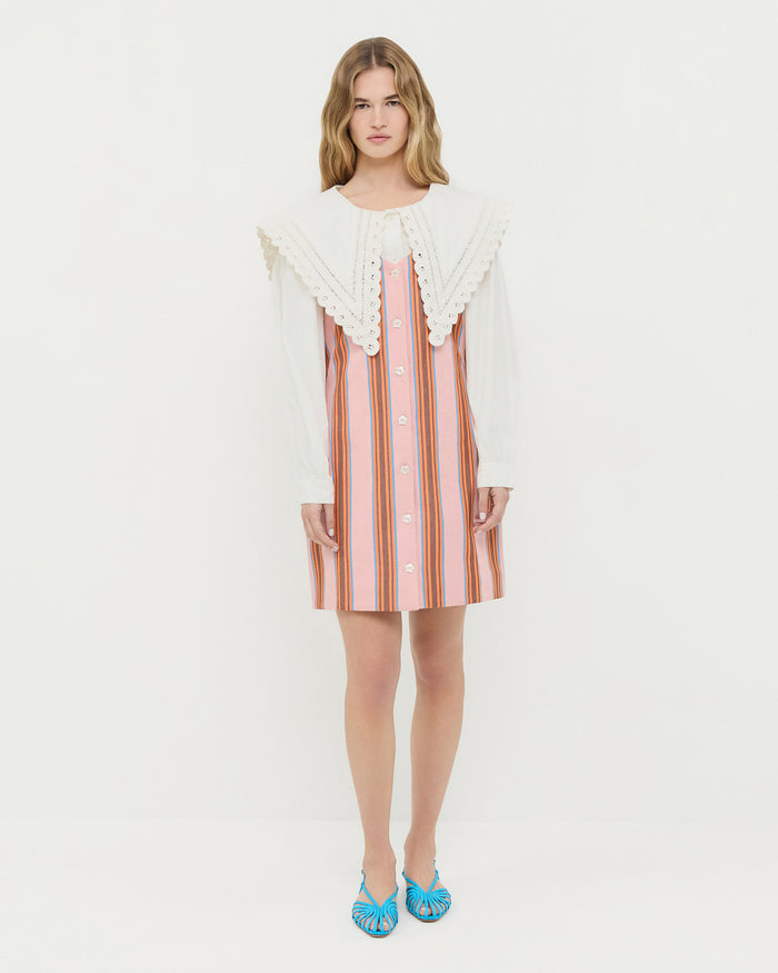 Tova sleeveless mini button-up dress in pink multi striped cotton-linen, Devon Blue Moire Slingback Sandal, and Ken Shirt in white cotton.