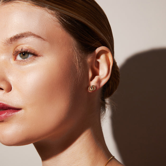 Model.  woman wearing double circle earring