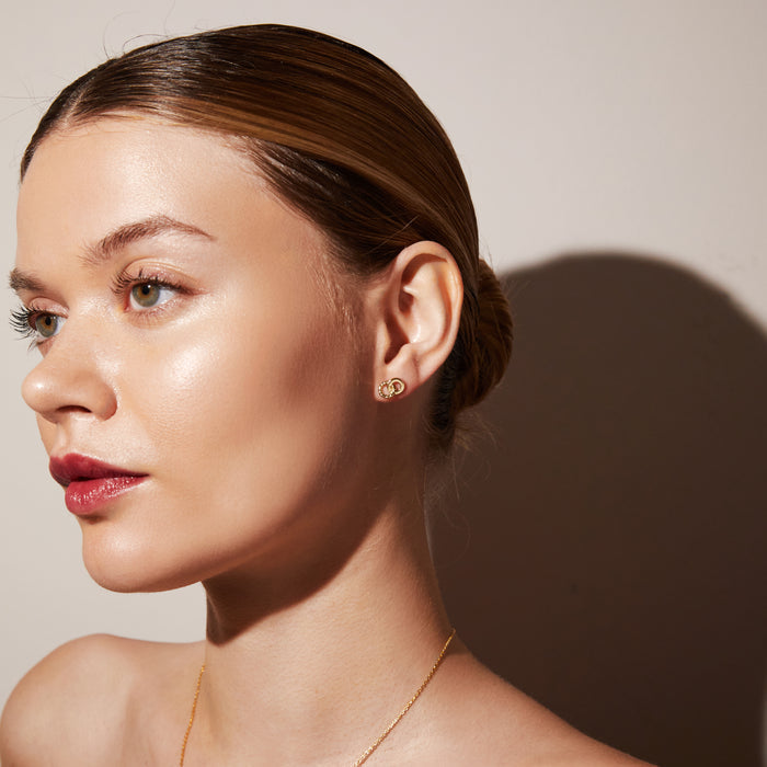 Model.  woman wearing double circle earring
