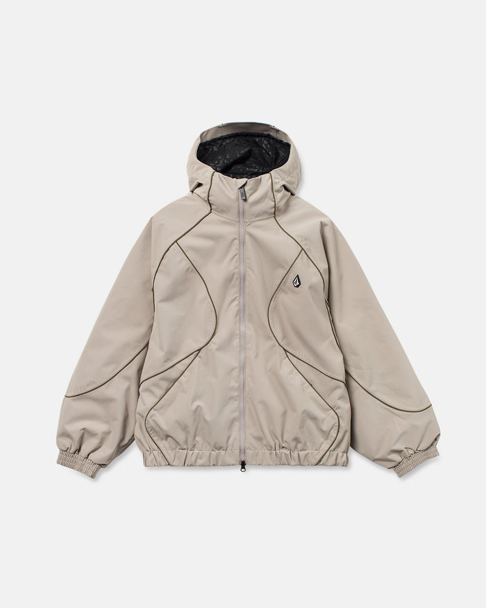 The Volcom Unisex Liftline 20K Jacket in light beige is showcased on a flat white background. Featuring a front zipper, elastic cuffs and hem, black interior lining, and curved seam detailing, this jacket boasts a baggy fit and 20K waterproof protection—perfect for staying both stylish and dry on the slopes.