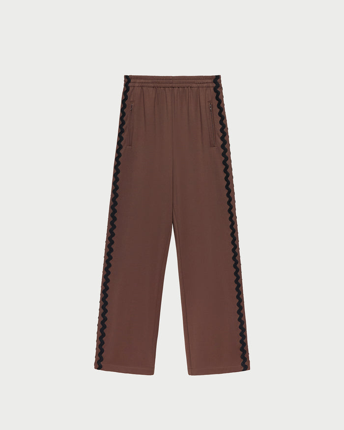 Venus Track Pant in brown nylon, Lolo Pointelle Long-Sleeve Top in espresso brown pointelle, and Topspin Cream/Maroon Court Sneaker.