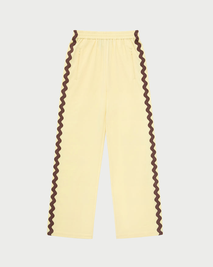 Venus Track Pant in butter yellow nylon.