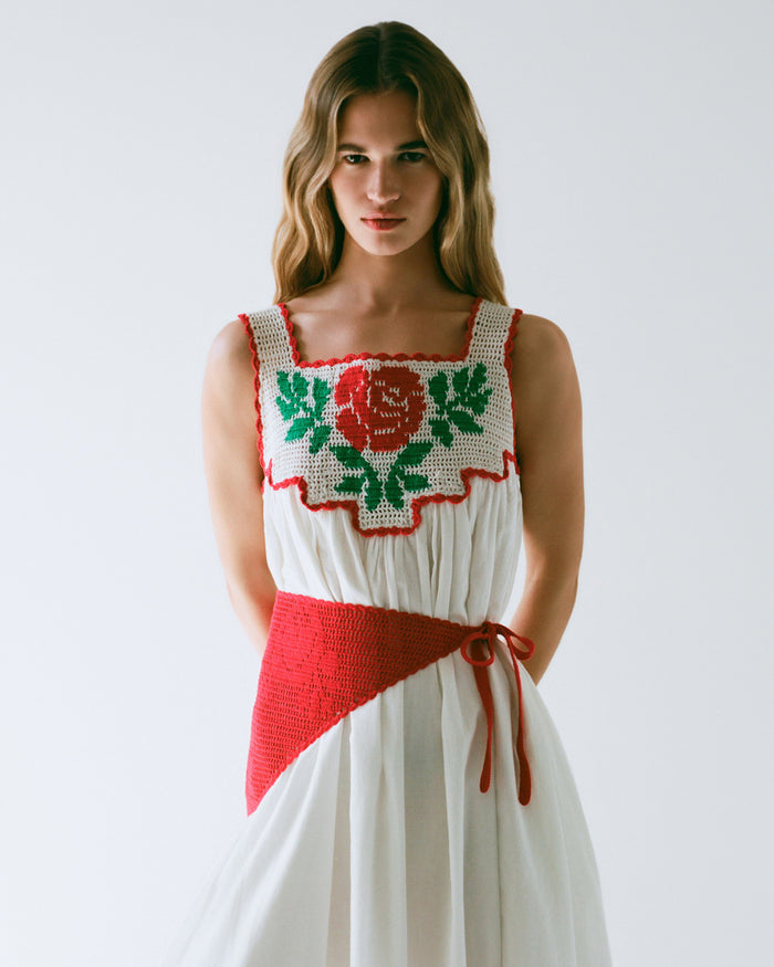 Viv Red Crochet Scarf in red crocheted cotton and Hetty Dress in white cotton with a flower crochet detail.
