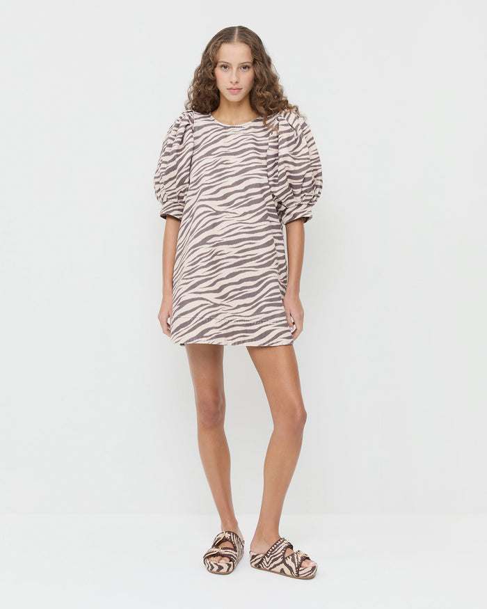 Willy Mini Dress in zebra print denim and Nico Zebra Two-Band Sandal.
