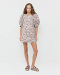 Willy Mini Dress in zebra print denim and Nico Zebra Two-Band Sandal.