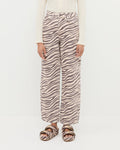 Winona Denim Pant in straight leg zebra print, Ash Cardigan in cream cotton, and Nico Zebra Two-Band Sandal.