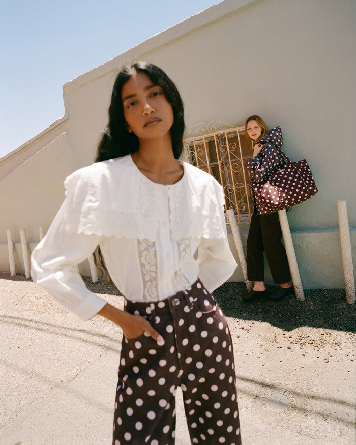 Winona Denim Pant in brown and cream polka dot denim and Gail Blouse in white cotton.