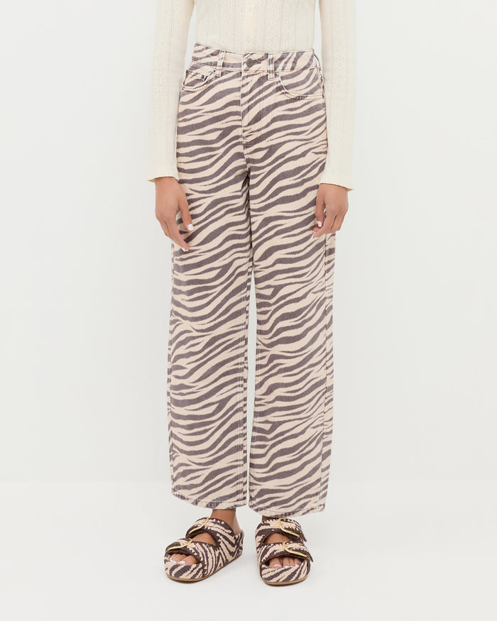 Winona Denim Pant in straight leg zebra print, Ash Cardigan in cream cotton, and Nico Zebra Two-Band Sandal.