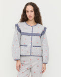 Winslet Jacket in blue floral cotton and Pasha Trouser in white floral cotton-linen.